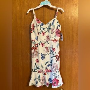 Floral white dress with from Macys. Never worn, size S and willing to negotiate!